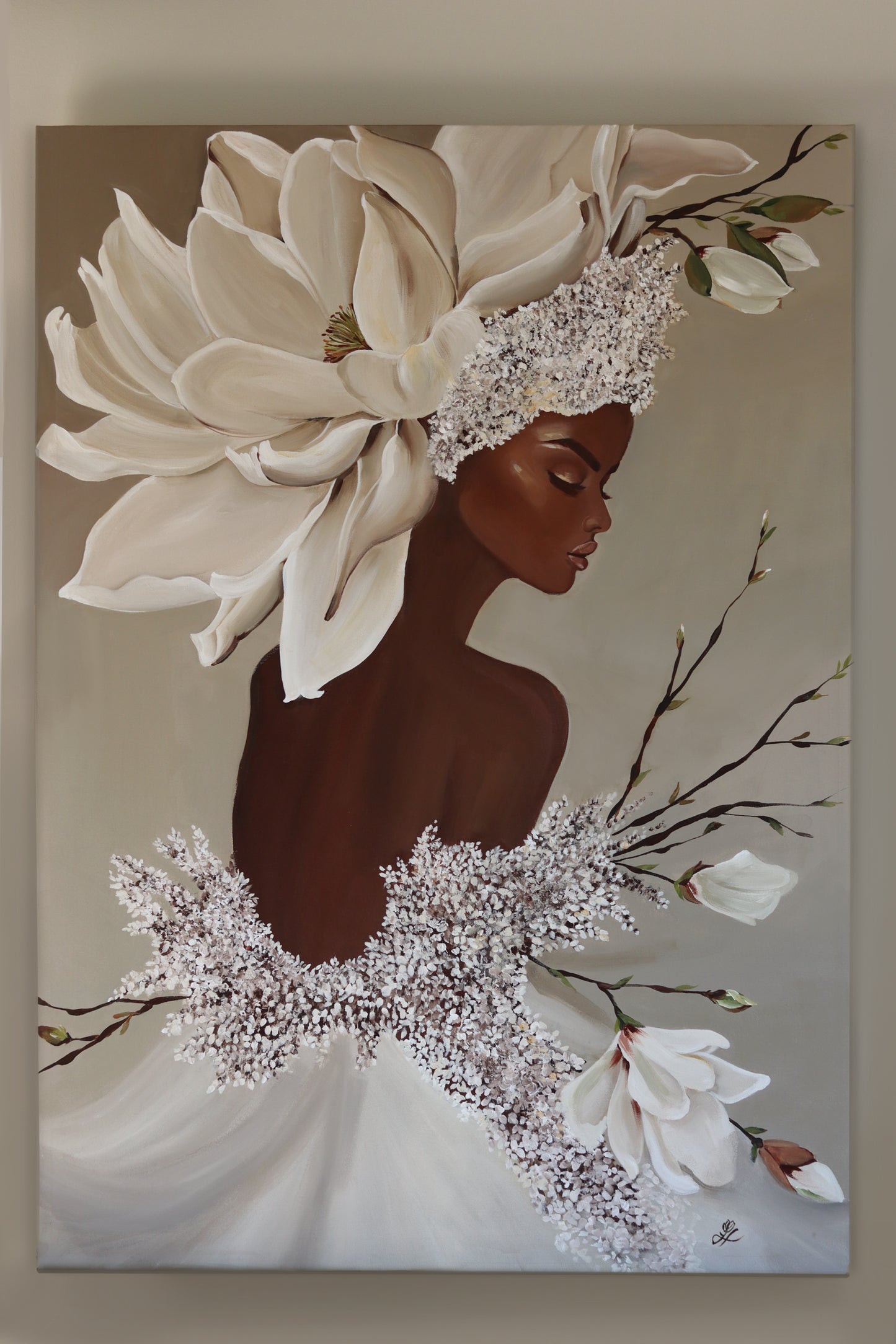 Full front view of the Queen Magnolia canvas painting featuring a woman with magnolia blossoms, photographed against a neutral background.