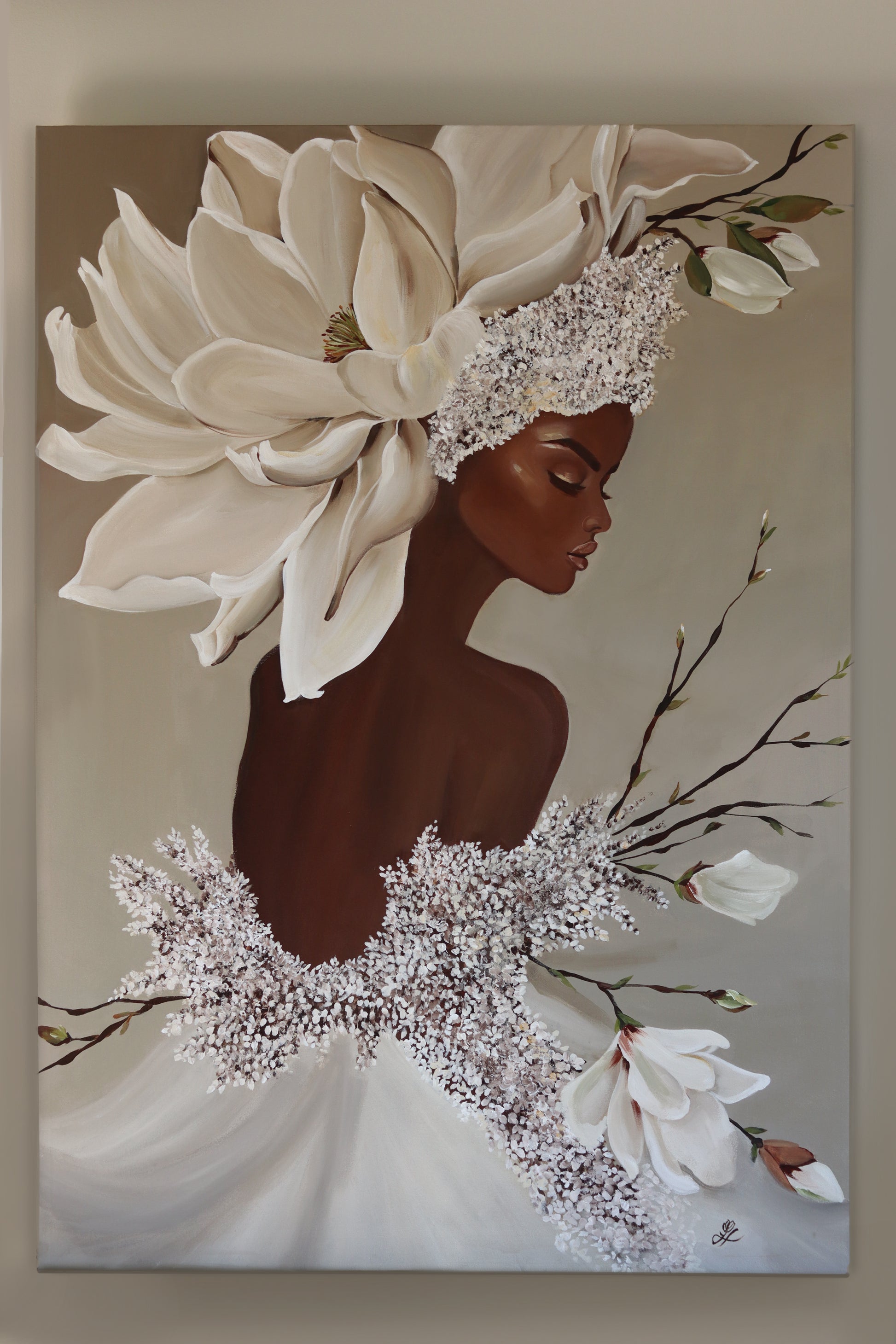Full front view of the Queen Magnolia canvas painting featuring a woman with magnolia blossoms, photographed against a neutral background.
