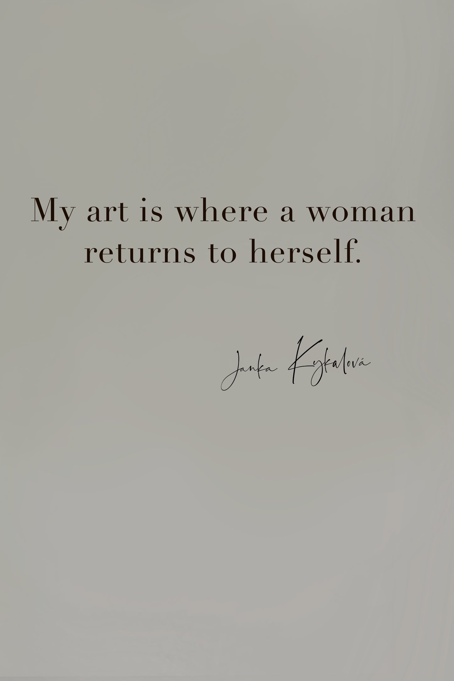 Graphic quote card with the text “My art is where a woman returns to herself” by Janka Kykalova on a taupe background.
